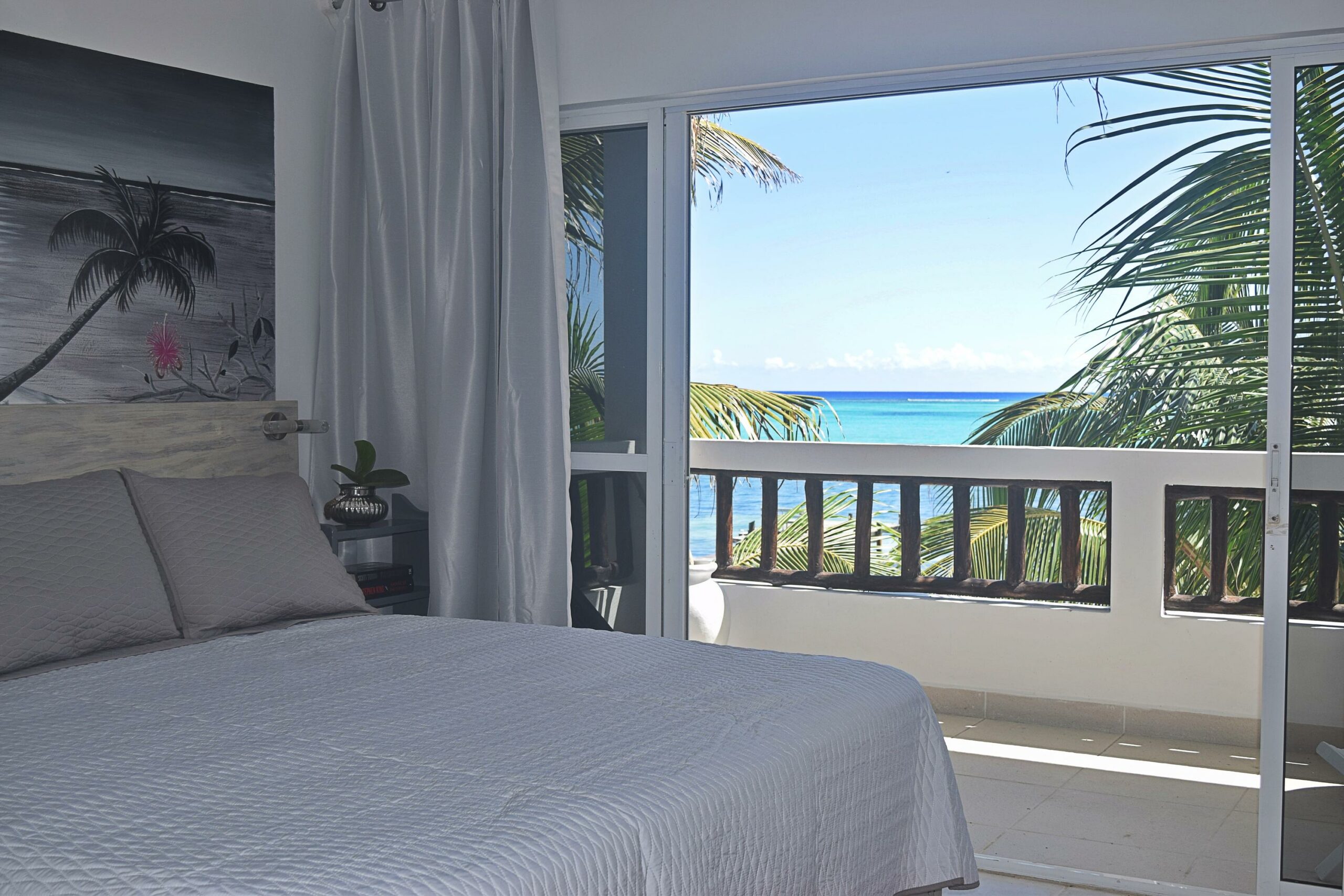 Room with a King Size bed overlooking the Caribbean Sea.