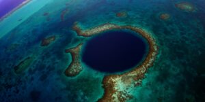 An aerial view of the Great Blue Hole in Belize