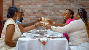 Friends happily toasting Rum Popo