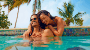 Couple relaxing at the pool in Belize