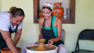 Lady doing a pottery making class in San Antonio, Cayo, Belize