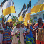 Procession of Garifuna people in Belize for Garifuna Settlement Day